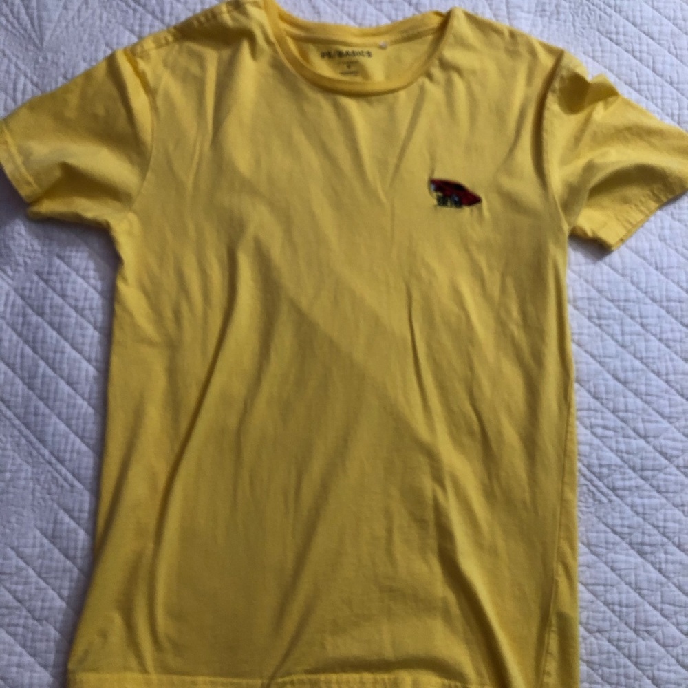 yellow shirt sleeved shirt